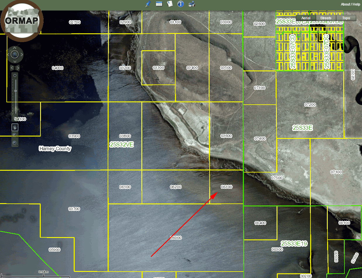 ORMAP aerial view with an approximate parcel outline beside the lake